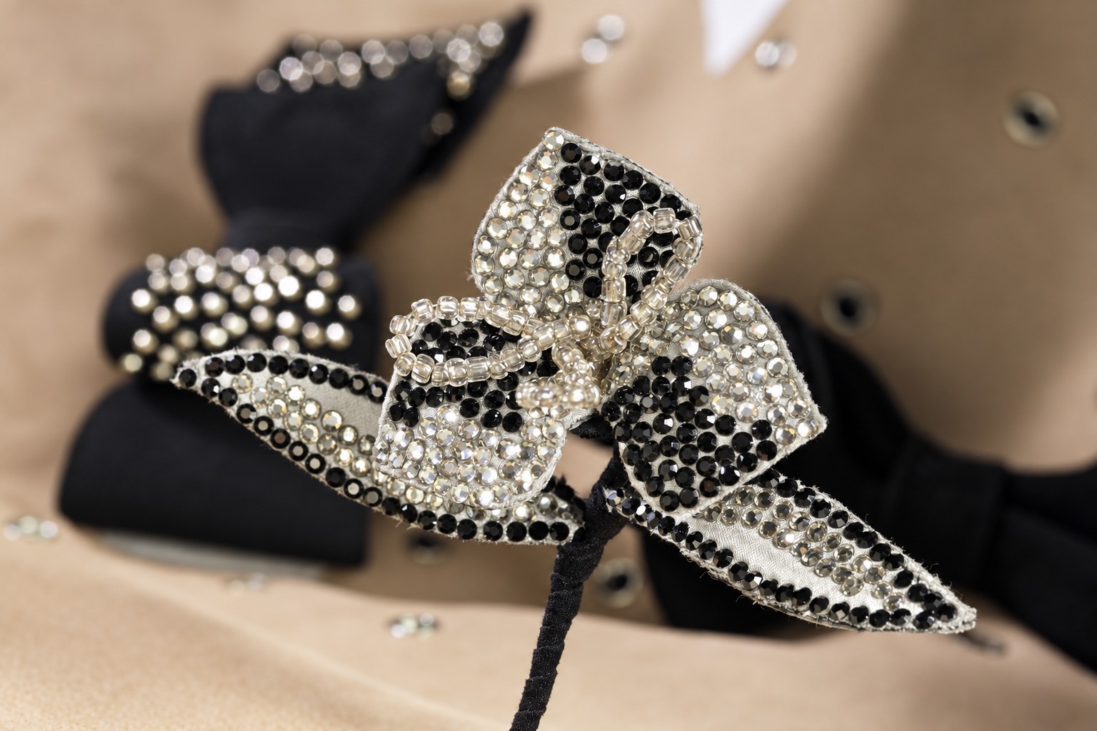 Bespoke accessories & headpieces — Digital presentation based on genuine work photography; not an unchanged original.